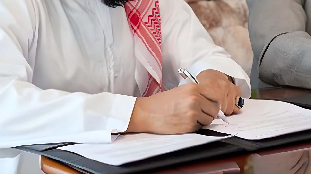 arab writing and signing legal documents arab writing and signing legal documents